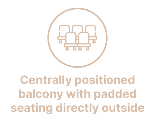 Centrally positioned balcony with padded balcony seating directly outside